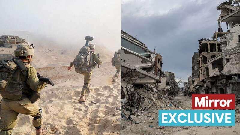 Palestinians walk past damaged buildings in Khan Yunis (Image: AFP via Getty Images)