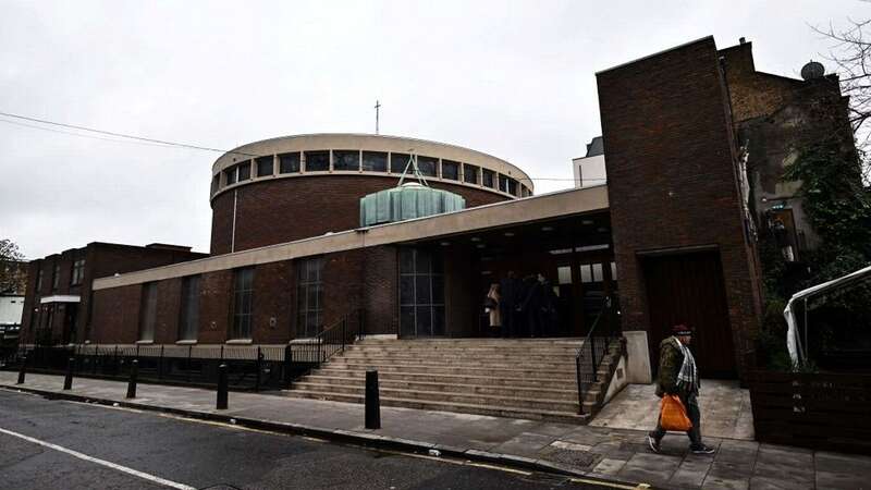 London police said on January 16, 2022 they had arrested a 22-year-old man after a seven-year-old girl was left fighting for her life following a shooting as mourners left a church service (Image: AFP via Getty Images)