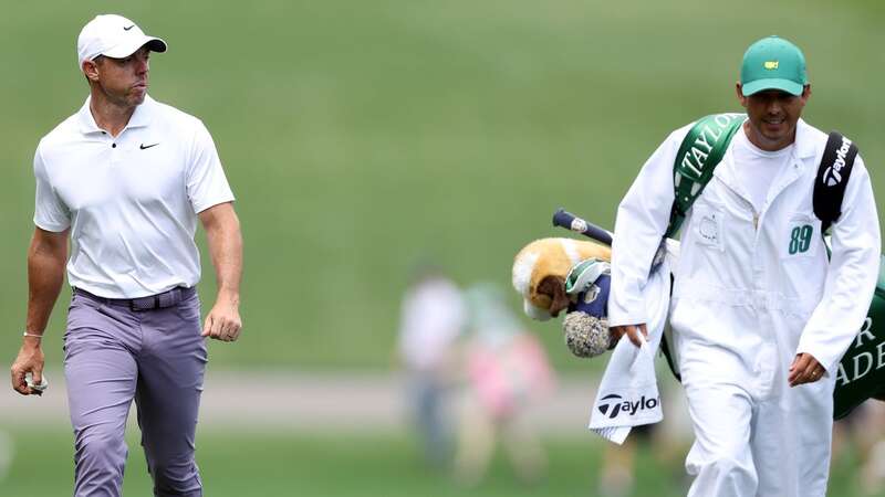 Jon Rahm and his caddie with the No.1 (Image: Getty Images)