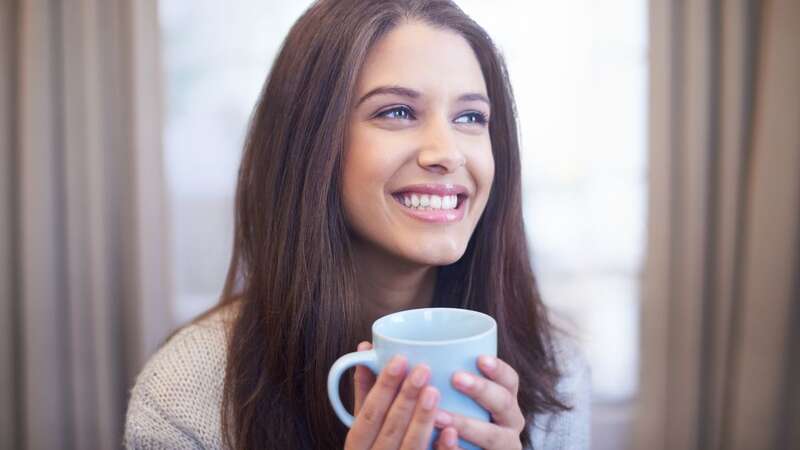 Drinking coffee can stain your teeth (stock photo) (Image: Getty Images)