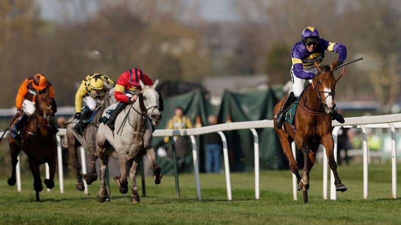 Corach Rambler with Derek Fox on board go clear up the Elbow on their way to to winning the Grand National in 2023