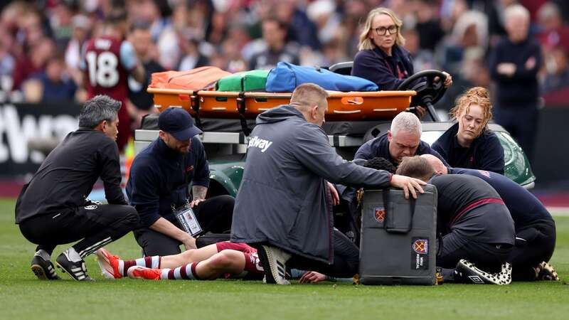 George Earthy of West Ham United receives medical treatment before being stretchered off (Image: Getty Images)