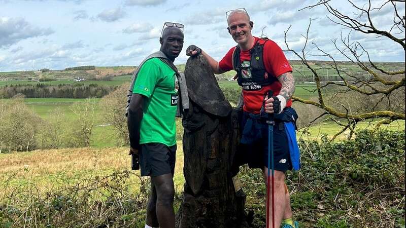 Kwasi and Mik on pitstop en route to Hillsborough