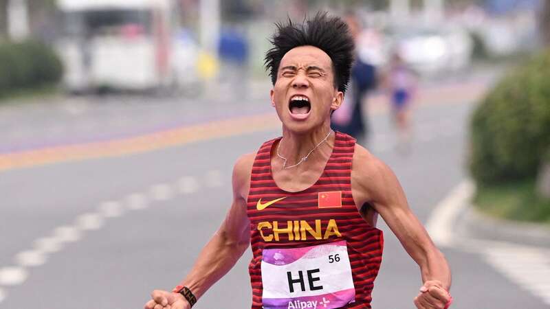 Chinese marathon runner He Jie is at the centre of major controversy (Image: WILLIAM WEST/AFP via Getty Images)