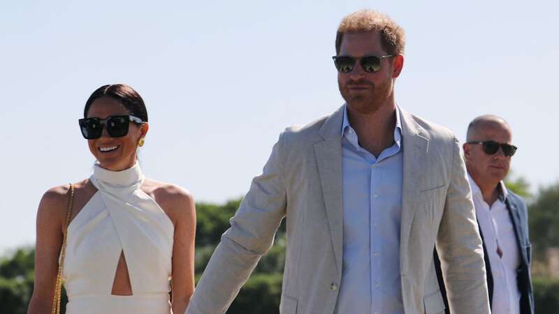 Harry and Meghan pictured at the polo event on Friday (Image: PA)