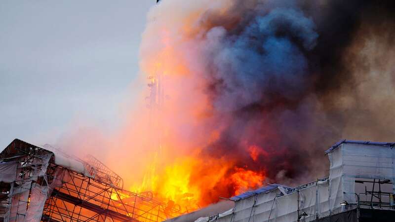 Old Stock Exchange spire collapses as huge fire rips through historic building