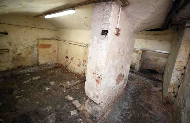 Homes hidden beneath a street reveal larger network of secret tunnels that could have been used by smugglers