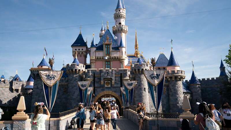 Visitors pass through Disneyland in Anaheim, California (Image: Copyright 2021 The Associated Press. All rights reserved.)