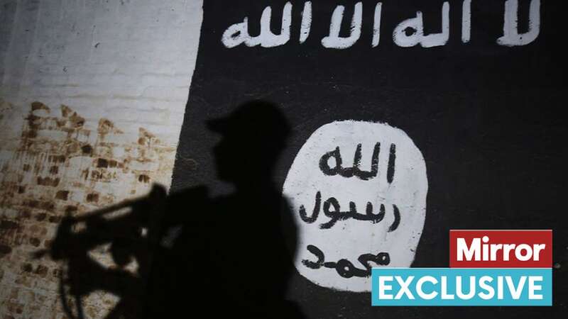 A banner with an ISIS logo in Iraq (Image: AFP via Getty Images)