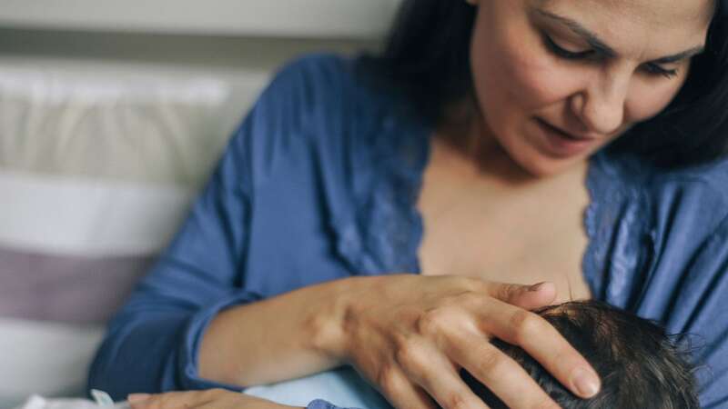 The mum still breastfeeds her nine-year-old daughter (stock) (Image: Getty Images)