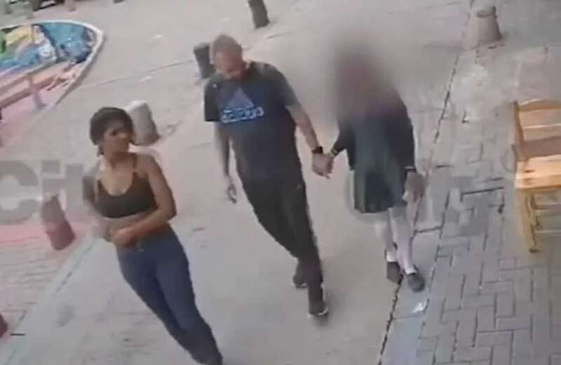 Both adults were filmed being led away in handcuffs after the grim footage was released