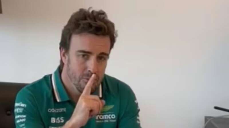 Fernando Alonso gave a cheeky gesture to the camera at the end of the video (Image: Aston Martin TikTok)