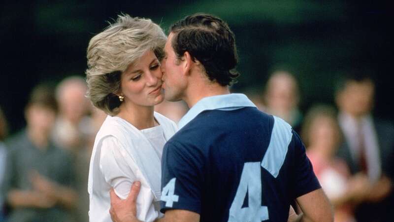 Prince Charles, then Prince of Wales kisses Princess Diana at prizegiving after a polo match at Cirencester (Image: Tim Graham Photo Library via Getty Images)