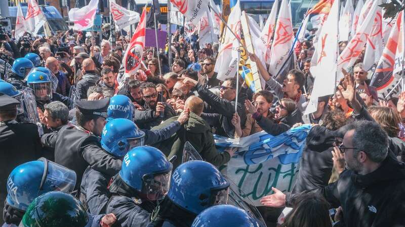 Demonstrators trying to break through a blockage to enter the city at Piazzale Roma in Venice, Italy (Image: Getty Images)