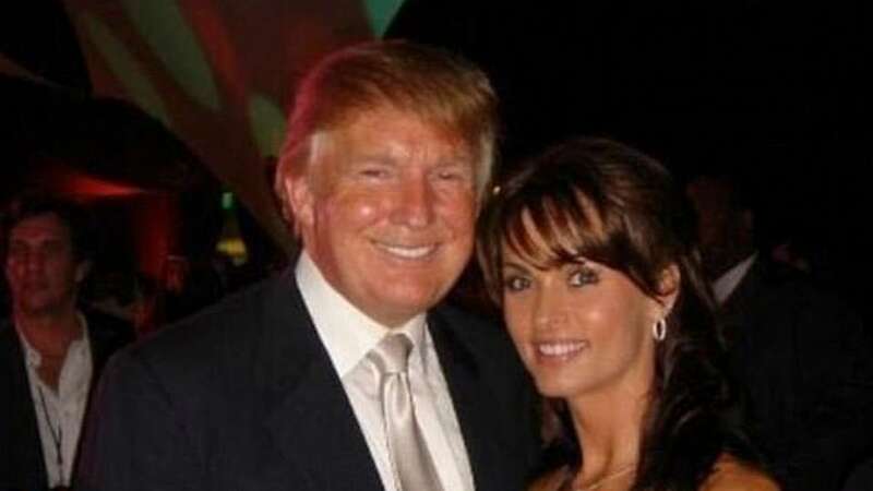 Trump with Karen McDougal, who accuses him of an affair while Melania was pregnant - that Donald denies (Image: Karen McDougal/Twitter)