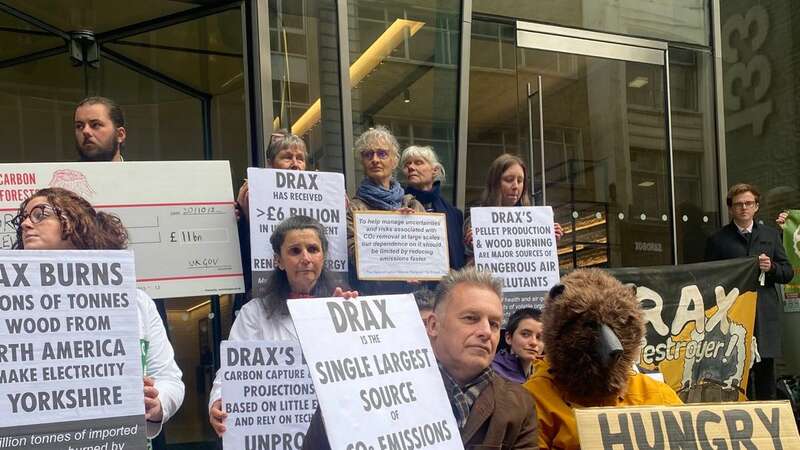 Broadcaster Chris Packham and members of the Axe Drax campaign group protesting outside the Drax AGM in London on Thursday (Image: Copyright remains with handout provider)