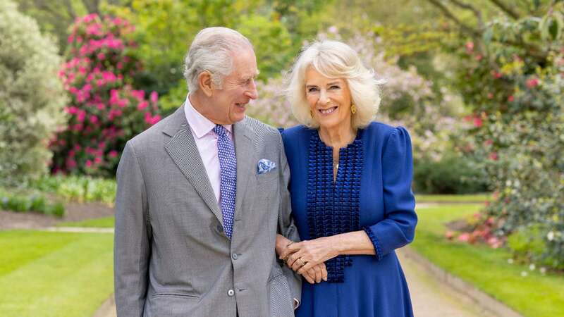 Millie Pilkington took this candid picture of Charles and Camilla at Buckingham Palace (Image: PA)