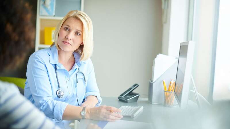 A doctor talking to a patient [file image] (Image: Getty Images)