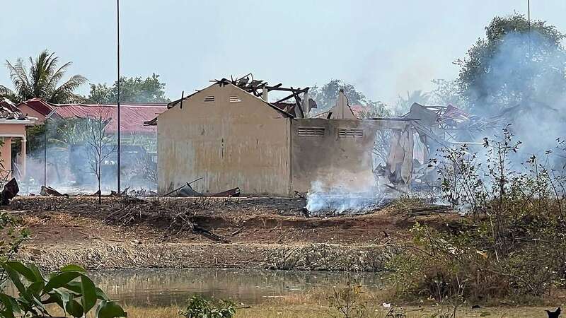 The smouldering wreckage following the explosion (Image: AFP via Getty Images)