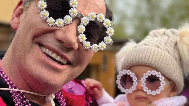 Craig Revel Horwood poses with the daughter of Strictly