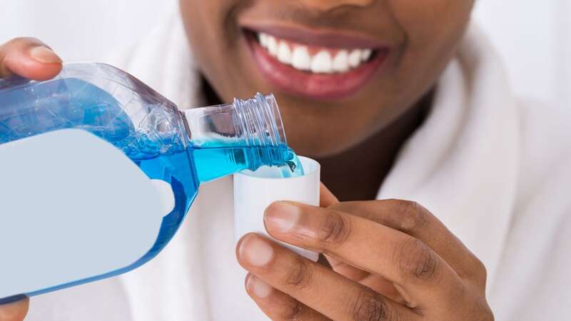 You could be making your oral hygiene worse if you use a mouthwash that stings (stock photo) (Image: Getty Images/iStockphoto)