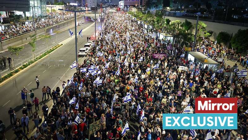 Thousands of Israelis wave flags in Tel Aviv yesterday calling for hostages rescue (Image: AFP via Getty Images)