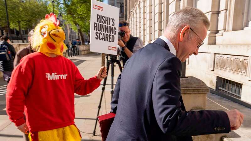 The Mirror Chicken greets Michael Gove as he arrives at Cabinet (Image: TIM ANDERSON)