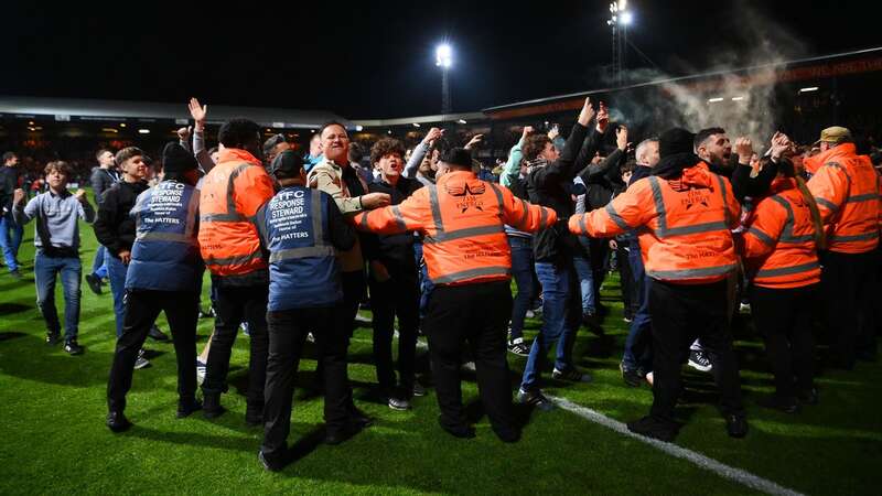 Fans have been warned not to invade the pitch (Image: Shaun Botterill/Getty Images)