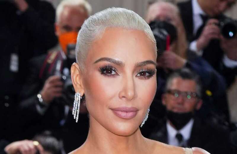 The iconic look was paired with a slicked-back platinum blonde updo