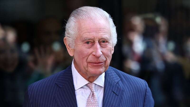 King Charles had a simple four-word response to Harry olive branch (Image: AFP via Getty Images)