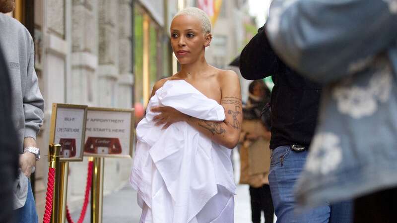 Doja Cat stepped out in a fitted sheet and thong in New York City (Image: SplashNews.com)