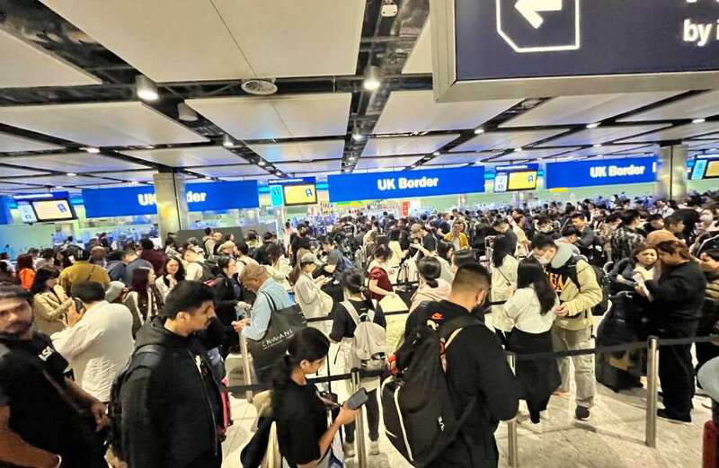 Photos show thousands of fuming British citizens waiting for their passports to be checked