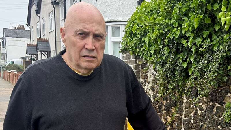 William Dordoy worries the wall may fall over and injure children on their way to school (Image: KMG/SWNS)