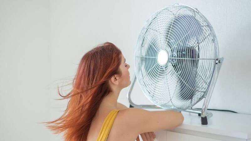 Get a fan that will help keep you cool this weekend (Image: Getty Images)