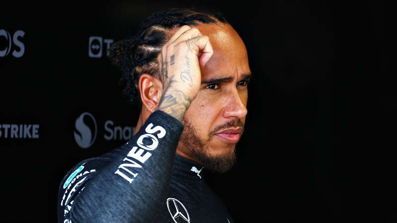 Lewis Hamilton looks on in the garage prior to practice (Image: Clive Rose - Formula 1/Formula 1 via Getty Images)