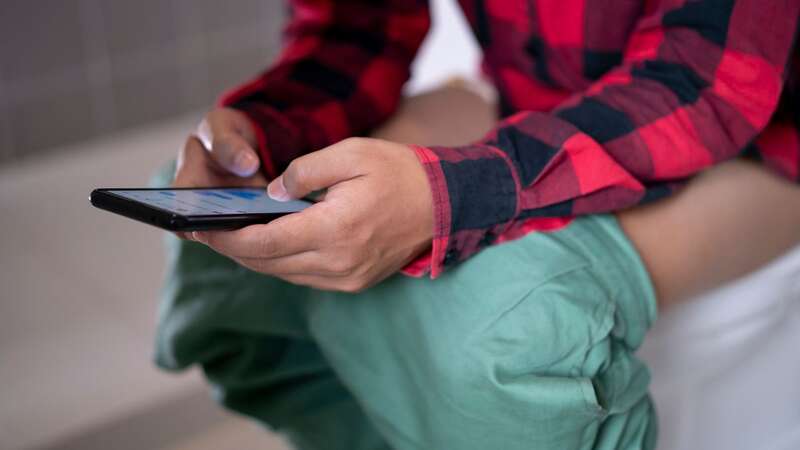 Many take their mobile phone to the toilet then put it on the dinner table (Image: Getty Images)