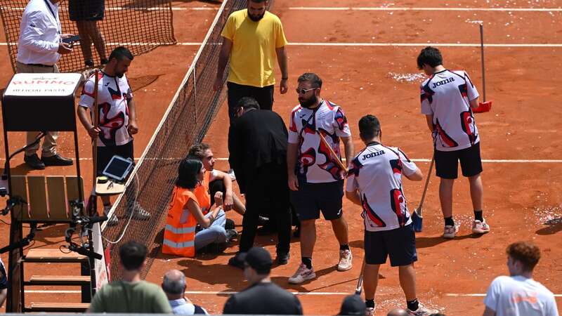 Protesters block the court during a Men