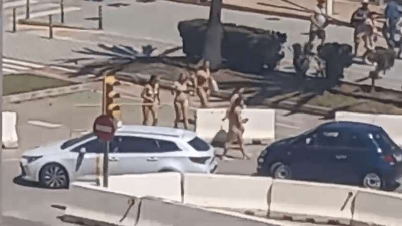 Another video showed a tourist popping down to the shops wearing just his swimming trunks