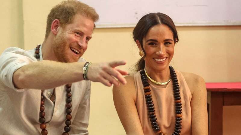 Prince Harry and Meghan Markle visited the school on Friday (Image: AFP via Getty Images)