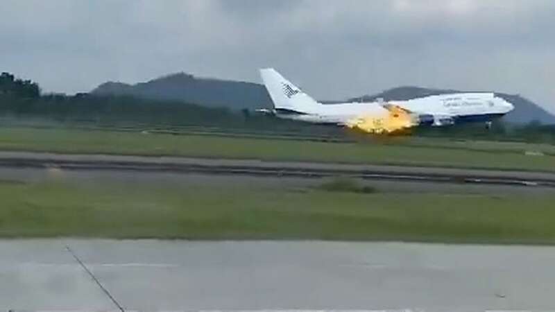 Moment flames leap from jumbo jet forcing pilots to make emergency landing