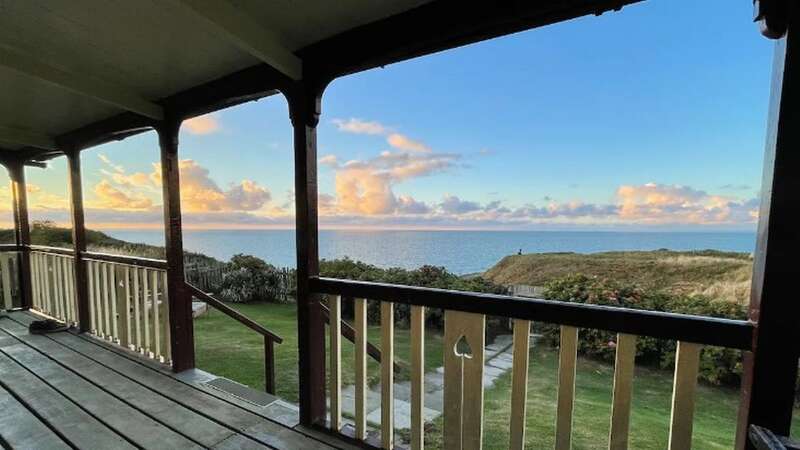 The idyllic location is perched high above the sea on a Heritage coastal path (Image: Airbnb)