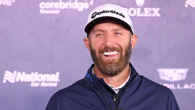 Dustin Johnson could not help but crack a smile after sharing the story of how he pulled a muscle in his lower back (Image: Getty Images)