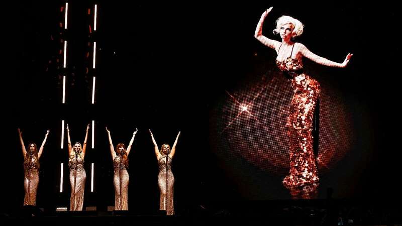 The band showed Sarah on the big screen during the encore (Image: Tom Dymond/REX/Shutterstock)