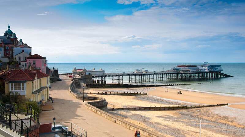 Cromer beach boasts stunning views and lush woodlands (Image: Getty Images/iStockphoto)