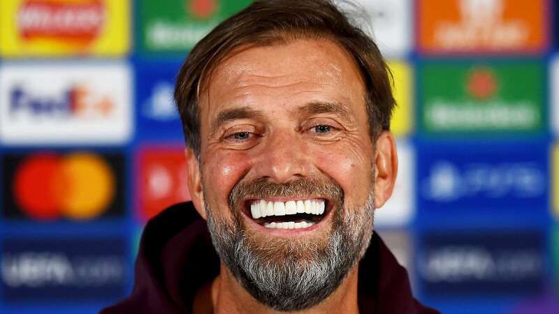 The manager shows off his beaming white smile in 2022 (Image: Liverpool FC via Getty Images)