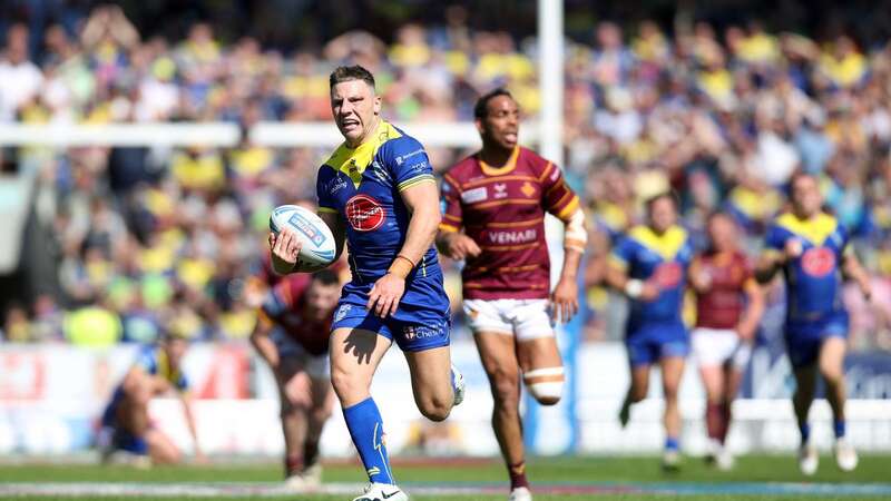 George Williams races away for his try against Huddersfield (Image: PA)