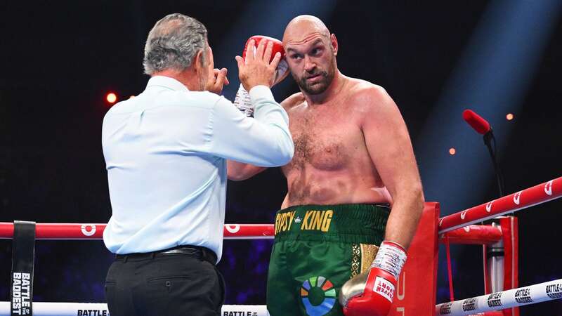 Referee Michael Griffin speaks to Tyson Fury (Image: Justin Setterfield)