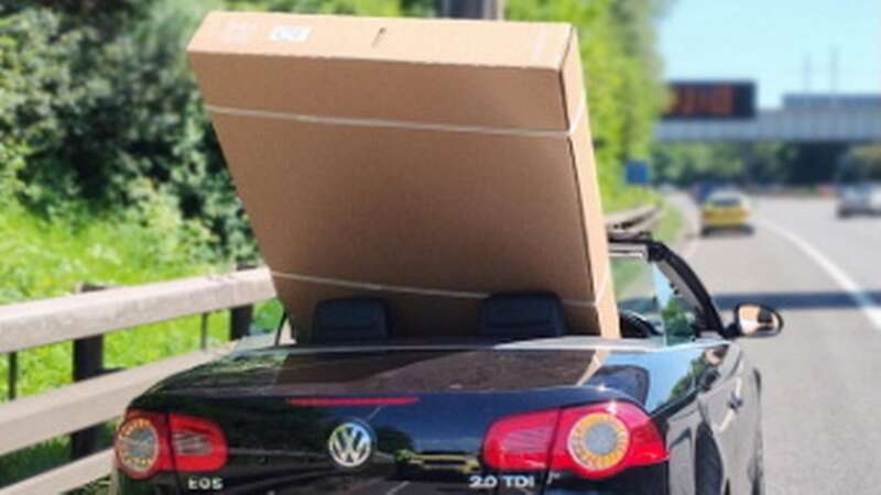 The car with the 60-inch wide television in the back (Image: GMP Traffic/SWNS)