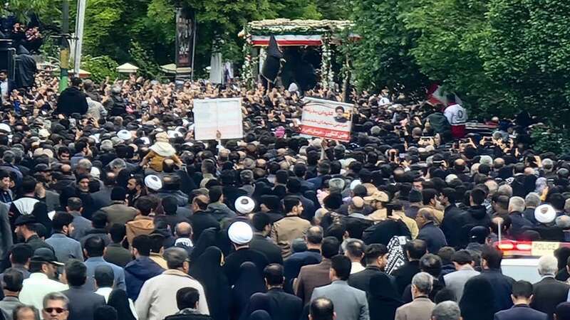 Iranian president’s 3-day funeral begins as coffin is paraded down streets