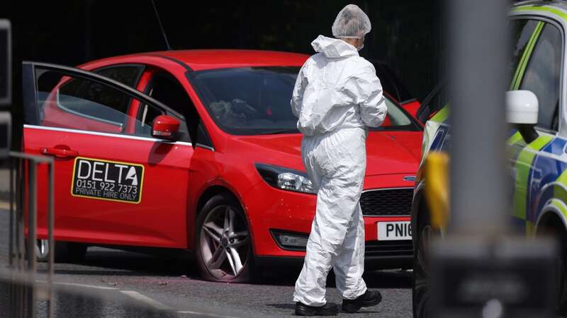 Armed police shoot out tyres of taxi and arrest man near football stadium